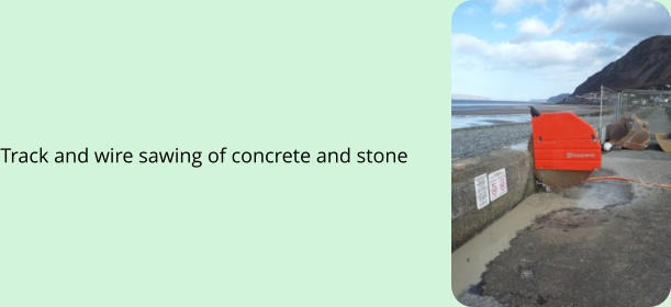 Track and wire sawing of concrete and stone